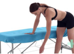Woman leaning on table with her arm and dangling her other arm