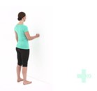 Woman standing with her wrist out