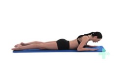 Lower back extension
Keep your hips down and relax your back. Push up with your arms to arch your back. Stop at the point where you feel a stretch in your lower back. Hold for a moment, and then slowly lower yourself back down.