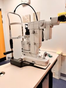 Image is a side view of the laser machine. 